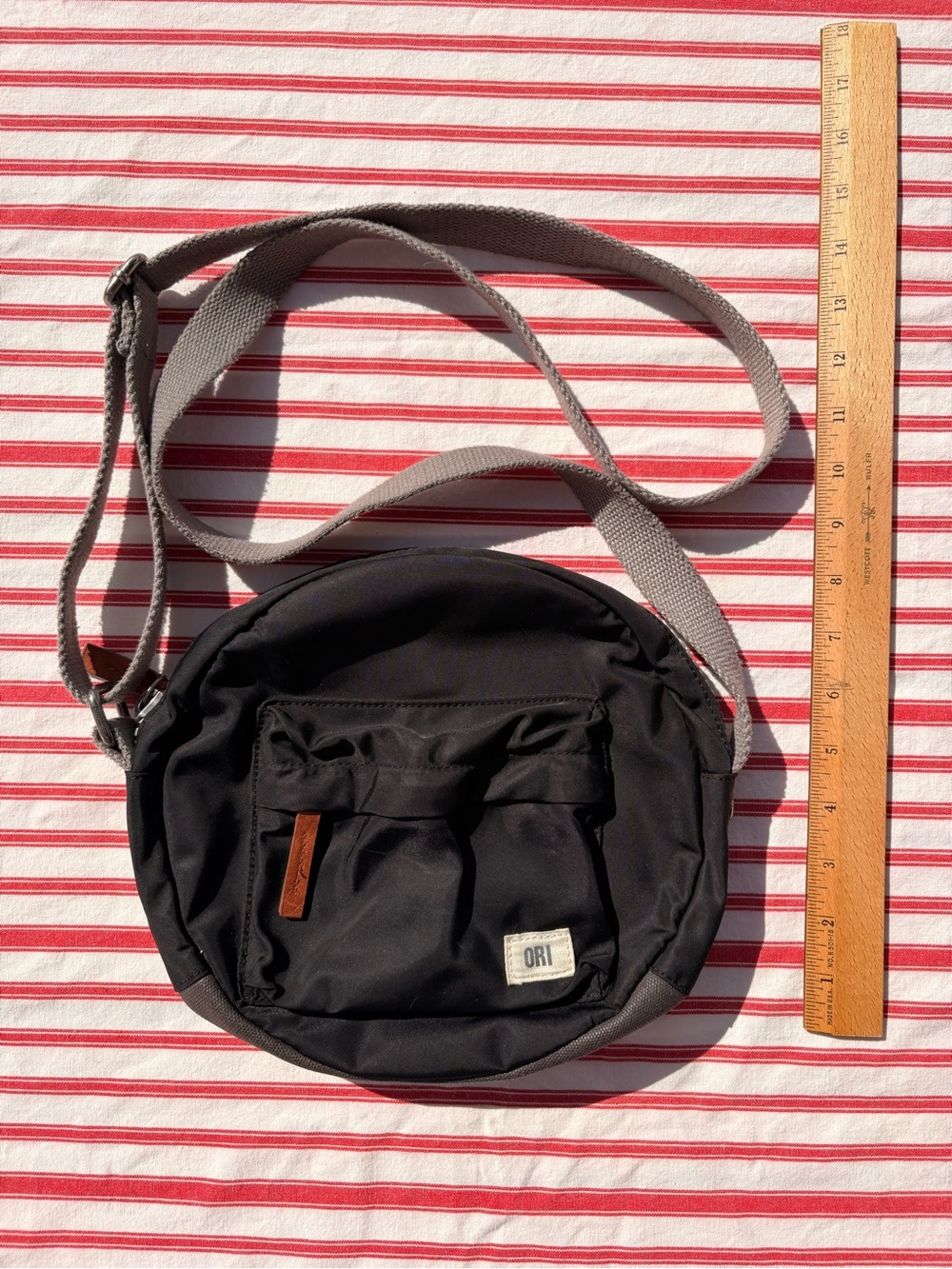 Black Round ORI Crossbody Bag with Gray Strap